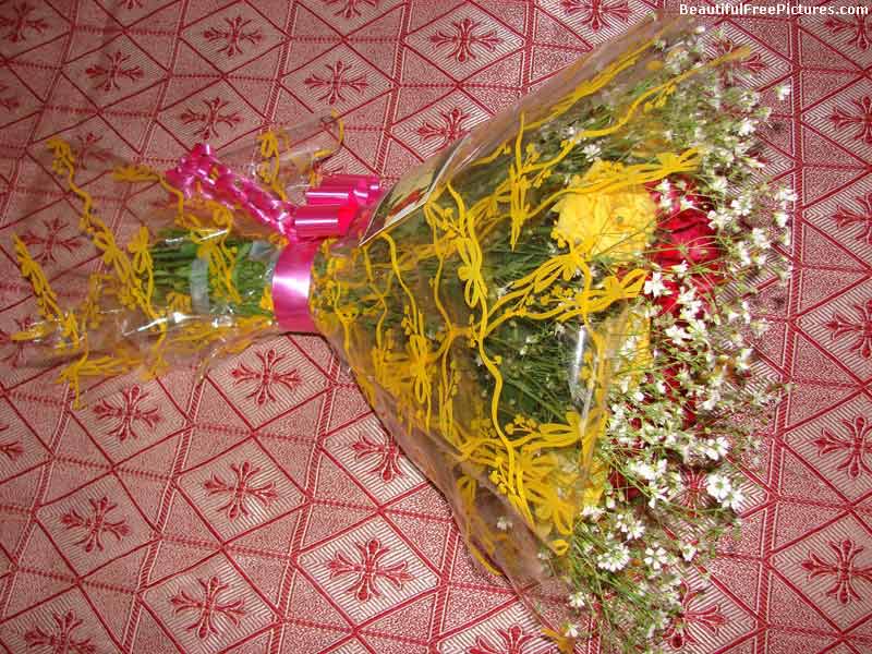 pictures of a bouquet on bed
