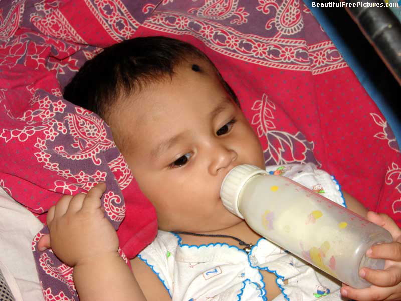 pictures of a child drinking milk
