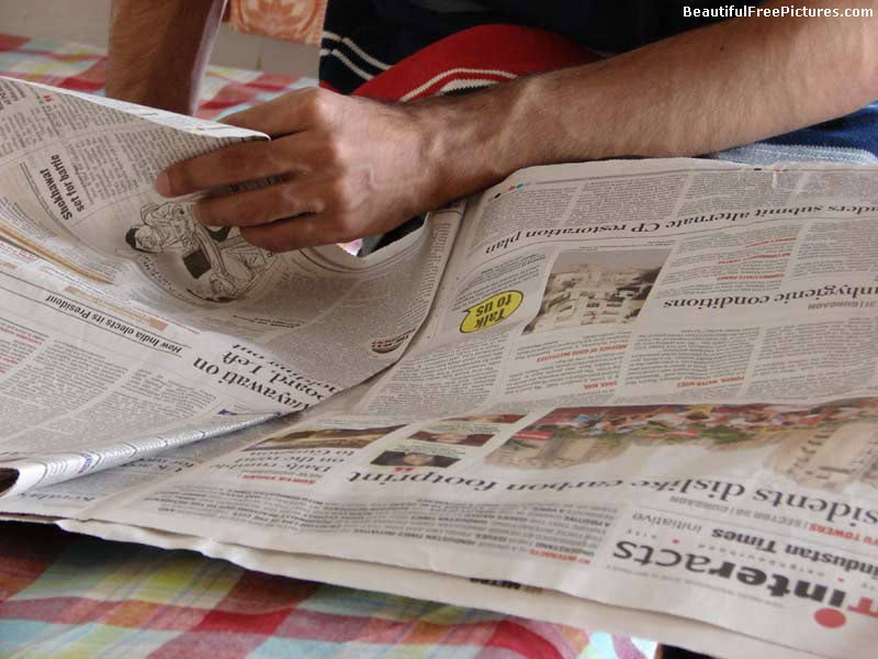 pictures of reading newspaper