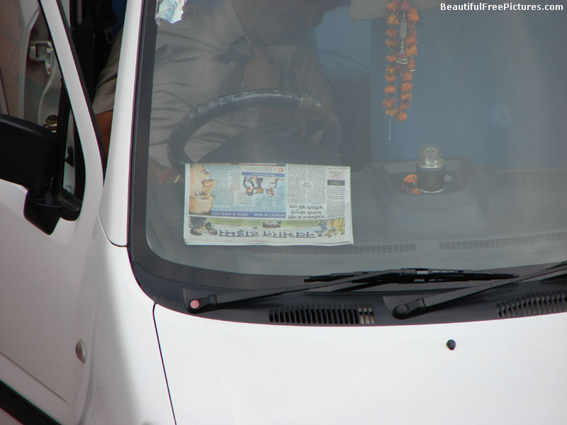 images of newspaper in a car