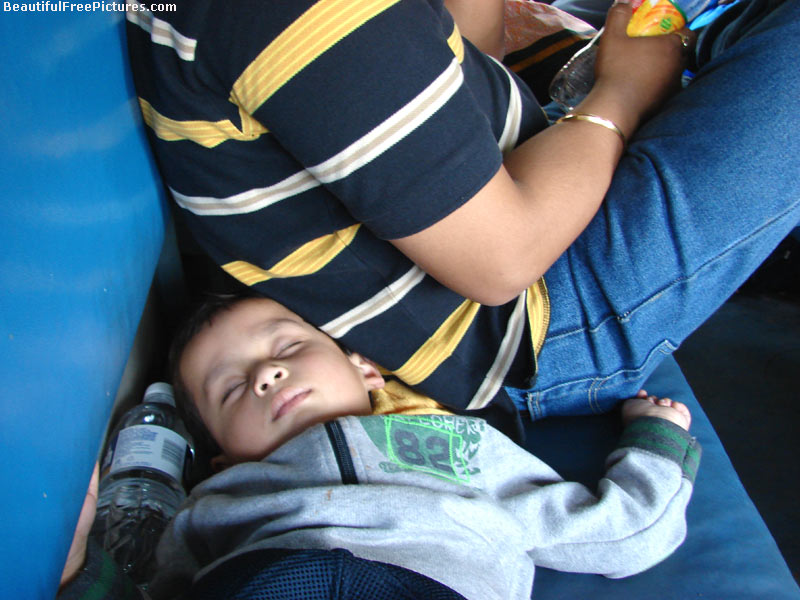 pictures of baby sleeping on train seat